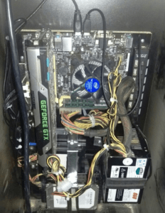 Naked PC inside cabinet